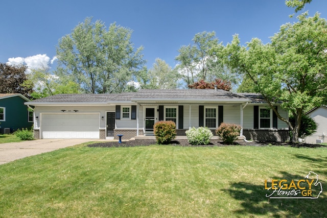 3051 Lantana Ct SE, Kentwood, MI 49512 - ranch-style house with a garage, concrete driveway, covered porch, and a front lawn