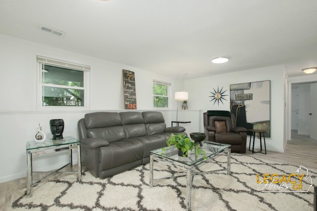 3051 Lantana Ct SE, Kentwood, MI 49512 - living room featuring wood finished floors