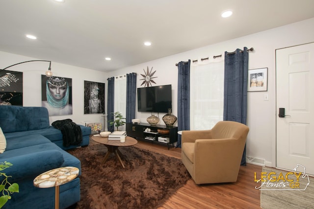 3051 Lantana Ct SE, Kentwood, MI 49512 - living area with wood finished floors and recessed lighting