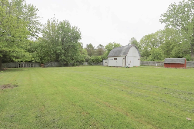 10432 W Wilson Rd, Montrose, MI 48457 - view of yard featuring a barn and view of scattered trees