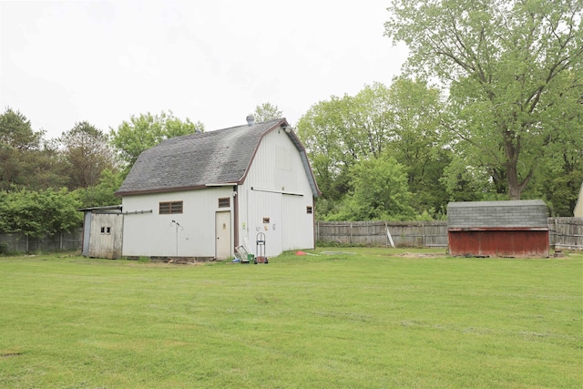 10432 W Wilson Rd, Montrose, MI 48457 - view of barn with a shed and view of wooded area