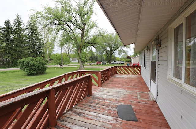 10432 W Wilson Rd, Montrose, MI 48457 - wooden terrace featuring a lawn