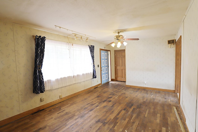 10432 W Wilson Rd, Montrose, MI 48457 - unfurnished room with wood-type flooring and a ceiling fan