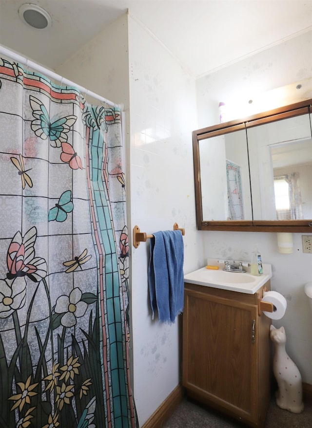10432 W Wilson Rd, Montrose, MI 48457 - full bathroom with vanity, a shower with shower curtain, and baseboards