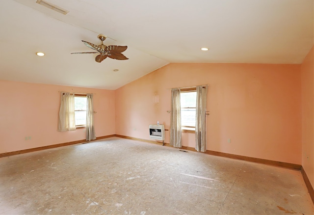 10432 W Wilson Rd, Montrose, MI 48457 - empty room featuring baseboards, heating unit, vaulted ceiling, ceiling fan, and recessed lighting