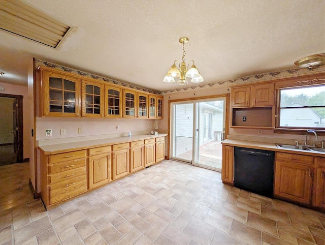 10432 W Wilson Rd, Montrose, MI 48457 - kitchen with dishwasher, a sink, a chandelier, light countertops, and glass insert cabinets