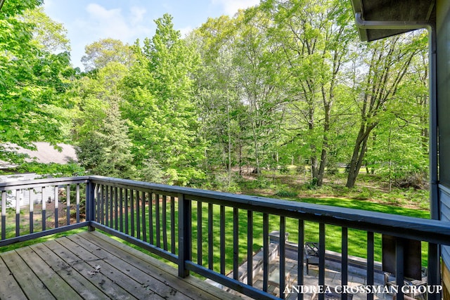 16993 Firefly Rdg, West Olive, MI 49460 - wooden terrace featuring a lawn