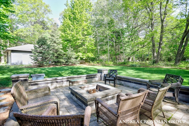 16993 Firefly Rdg, West Olive, MI 49460 - view of patio / terrace featuring a fire pit