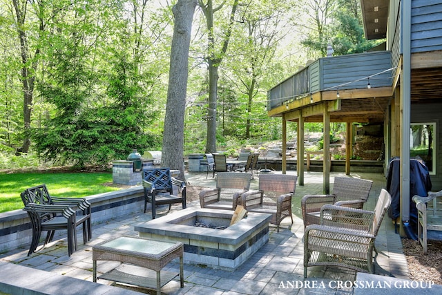 16993 Firefly Rdg, West Olive, MI 49460 - view of patio with an outdoor fire pit