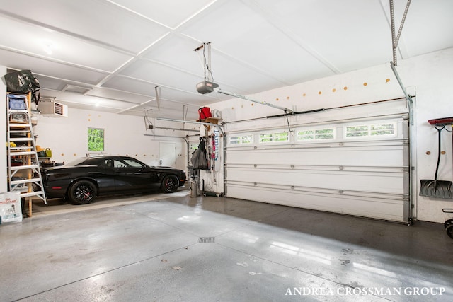 16993 Firefly Rdg, West Olive, MI 49460 - garage featuring a garage door opener