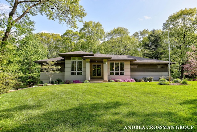 16993 Firefly Rdg, West Olive, MI 49460 - prairie-style house featuring a front lawn and roof with shingles