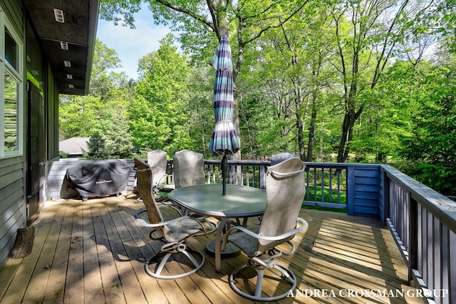16993 Firefly Rdg, West Olive, MI 49460 - wooden terrace featuring outdoor dining area and area for grilling