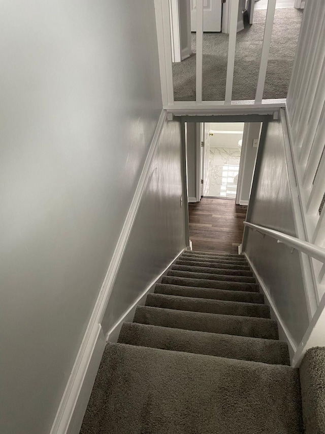 19943 Southfield Fwy, Detroit, MI 48235 - stairs featuring carpet flooring