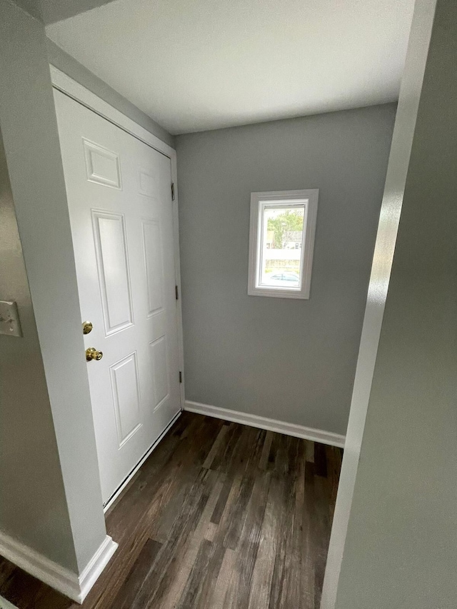 19943 Southfield Fwy, Detroit, MI 48235 - unfurnished bedroom featuring dark wood finished floors and baseboards