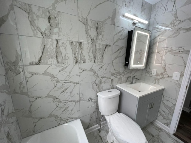 19943 Southfield Fwy, Detroit, MI 48235 - bathroom with vanity, marble finish flooring, a tub, and toilet