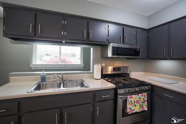 43800 Proctor Rd, Canton, MI 48188 - kitchen with appliances with stainless steel finishes, a sink, and light countertops