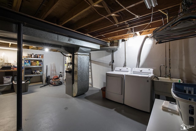 43800 Proctor Rd, Canton, MI 48188 - unfinished basement with washer and dryer, heating unit, and a sink
