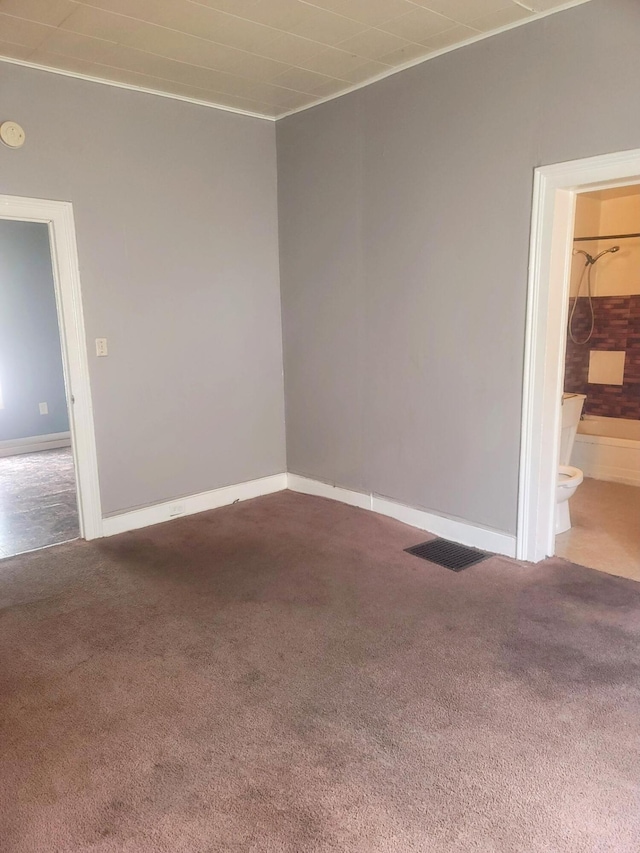 427 Highland St SE, Grand Rapids, MI 49507 - carpeted empty room featuring baseboards