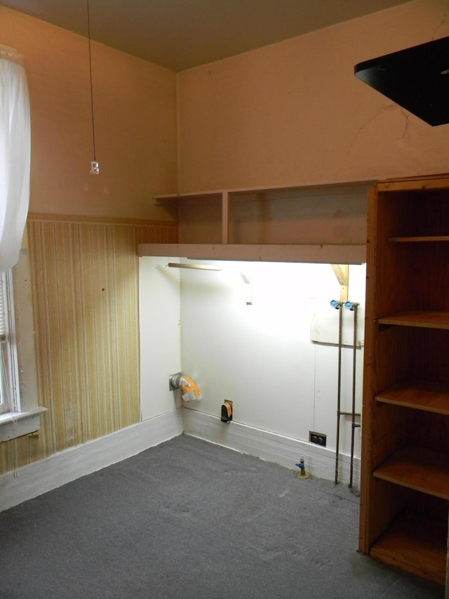 306 N Rowe St, Ludington, MI 49431 - laundry room with carpet