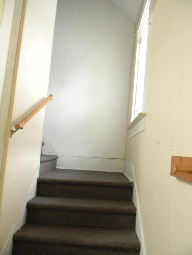 306 N Rowe St, Ludington, MI 49431 - stairs with lofted ceiling
