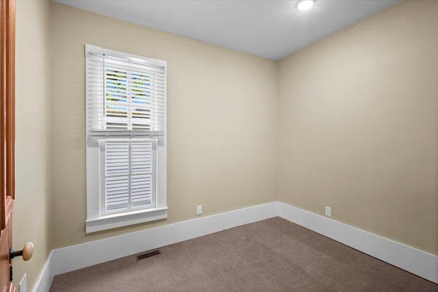 152 National Ave SW, Grand Rapids, MI 49504 - carpeted spare room with baseboards