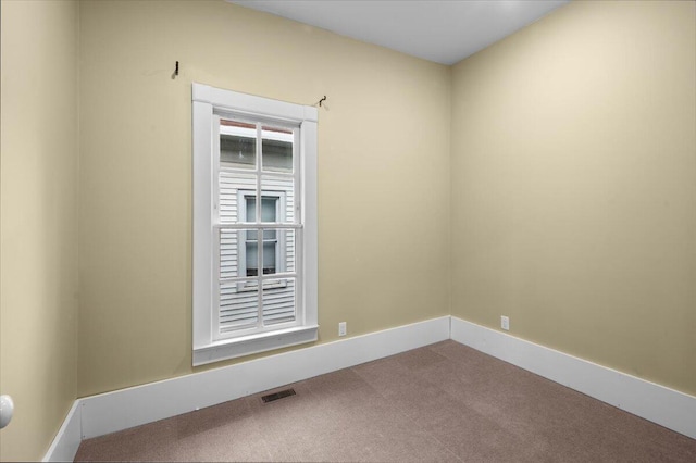 152 National Ave SW, Grand Rapids, MI 49504 - carpeted empty room with baseboards