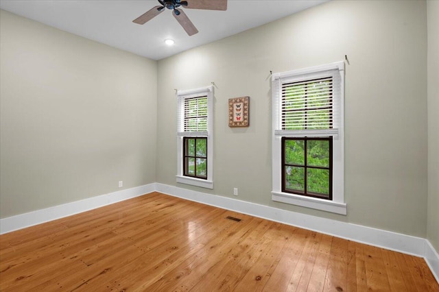 152 National Ave SW, Grand Rapids, MI 49504 - empty room featuring baseboards, light wood-style floors, and ceiling fan
