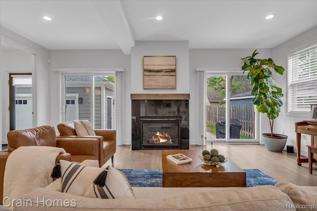 1748 Stanley Blvd, Birmingham, MI 48009 - living area with a fireplace, recessed lighting, wood finished floors, and beam ceiling