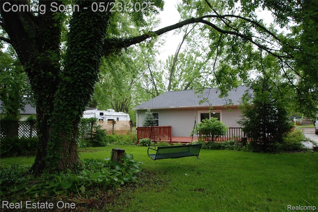 5399 Brobeck St, Flint, MI 48532 - back of property featuring a deck
