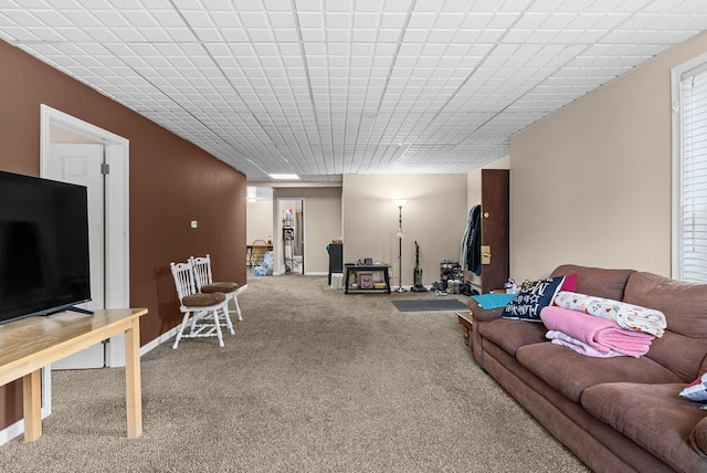 612 E 3rd St, Flint, MI 48503 - carpeted living area with baseboards