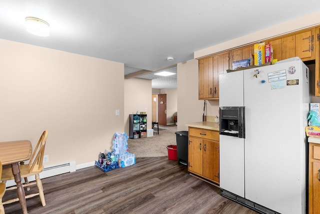 612 E 3rd St, Flint, MI 48503 - kitchen featuring white fridge with ice dispenser, dark wood finished floors, brown cabinetry, and light countertops
