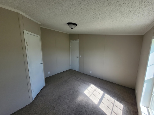 4908 Brookfield Rd, Charlotte, MI 48813 - carpeted spare room with a textured ceiling and crown molding