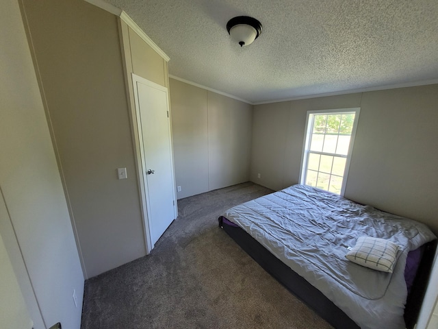 4908 Brookfield Rd, Charlotte, MI 48813 - carpeted bedroom with a textured ceiling and crown molding