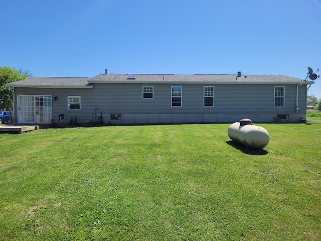 4908 Brookfield Rd, Charlotte, MI 48813 - back of property featuring a lawn