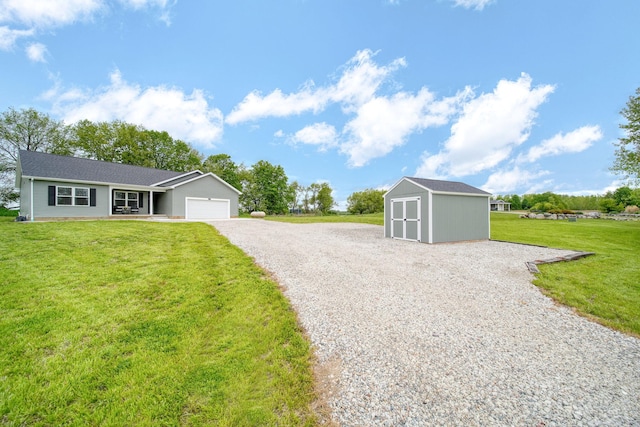 5726 Joshua Dr, Eaton Rapids, MI 48827 - single story home featuring a front lawn, gravel driveway, and an attached garage