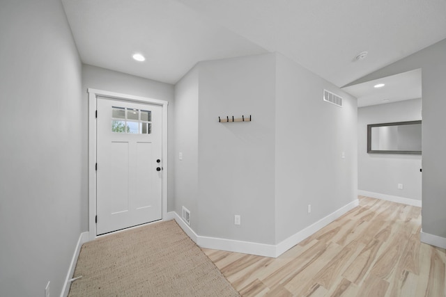 5726 Joshua Dr, Eaton Rapids, MI 48827 - foyer entrance with baseboards, wood finished floors, and recessed lighting