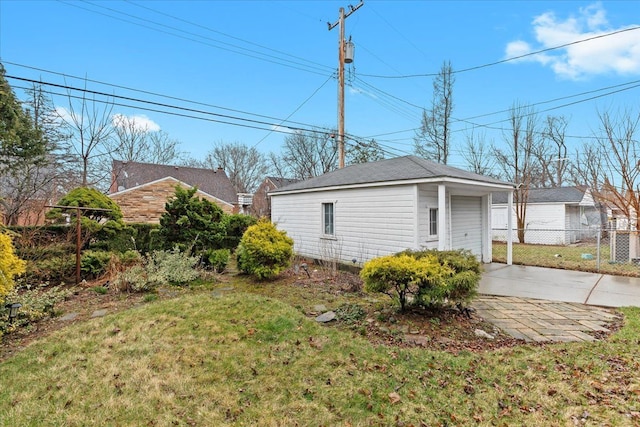 8156 Grayfield St, Dearborn Heights, MI 48127 - view of property exterior with driveway, an outdoor structure, and a garage