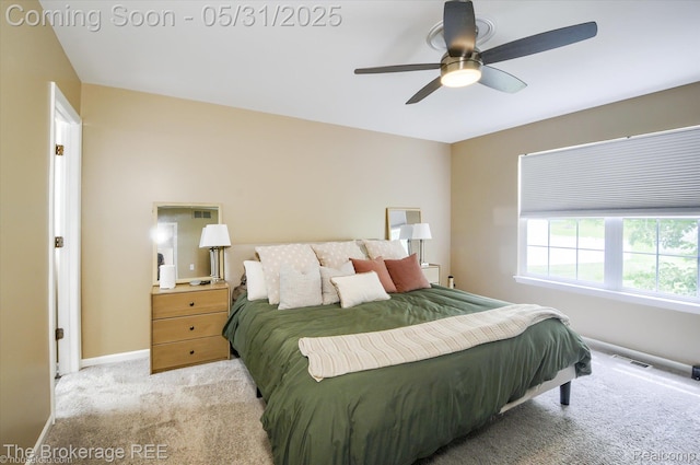 4422 Jordan Dr, Grand Blanc, MI 48439 - bedroom featuring light colored carpet, baseboards, and a ceiling fan