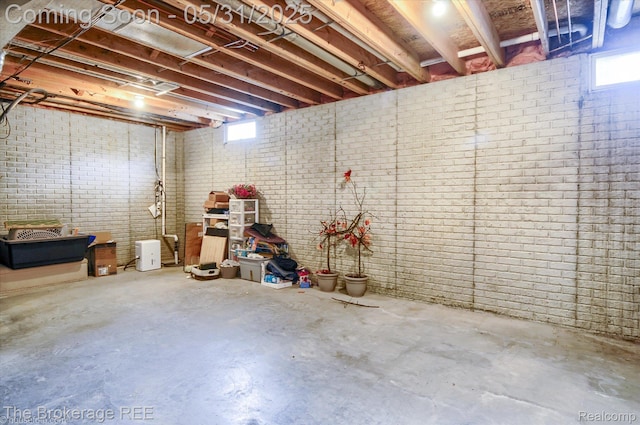 4422 Jordan Dr, Grand Blanc, MI 48439 - below grade area featuring brick wall