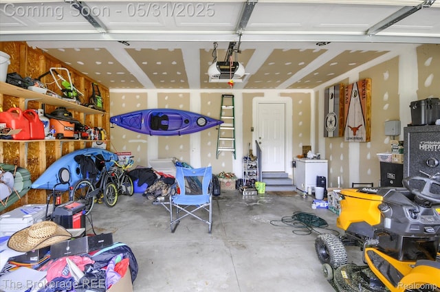4422 Jordan Dr, Grand Blanc, MI 48439 - garage featuring a garage door opener