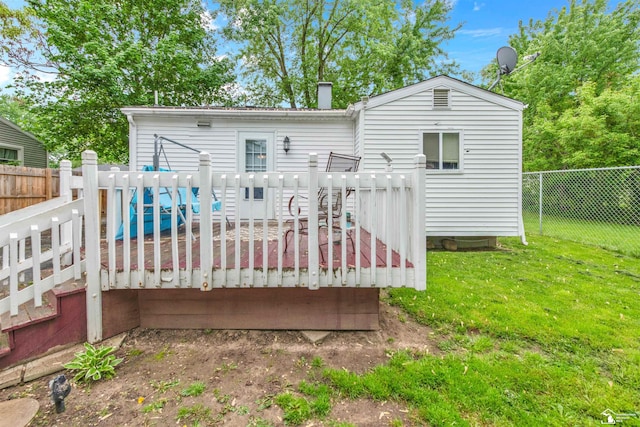 12323 Oakland Ave, Mount Morris, MI 48458 - back of house with a deck and a chimney