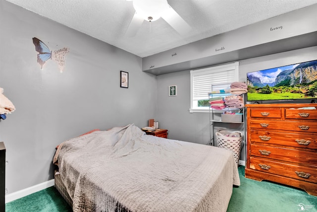 12323 Oakland Ave, Mount Morris, MI 48458 - carpeted bedroom featuring a textured ceiling, baseboards, and a ceiling fan