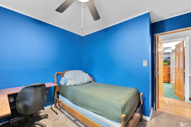 12323 Oakland Ave, Mount Morris, MI 48458 - carpeted bedroom featuring crown molding, ceiling fan, a desk, and baseboards