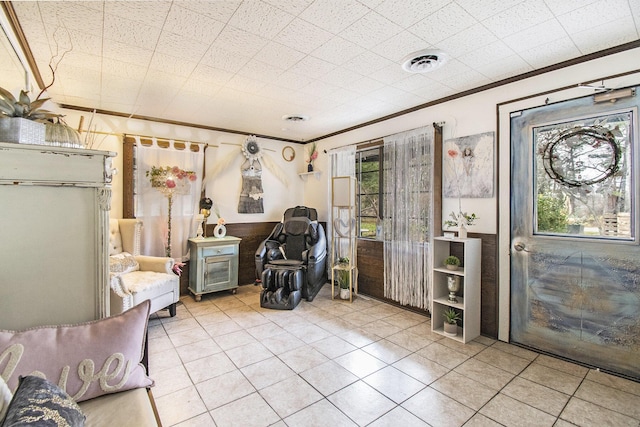 4491 S Jackson Rd, Jackson, MI 49201 - living area with tile patterned floors and ornamental molding