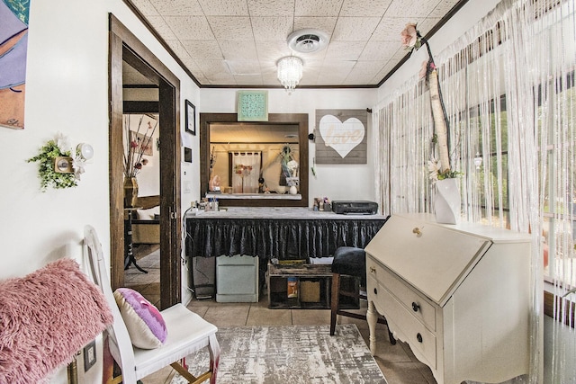 4491 S Jackson Rd, Jackson, MI 49201 - miscellaneous room featuring tile patterned floors and crown molding
