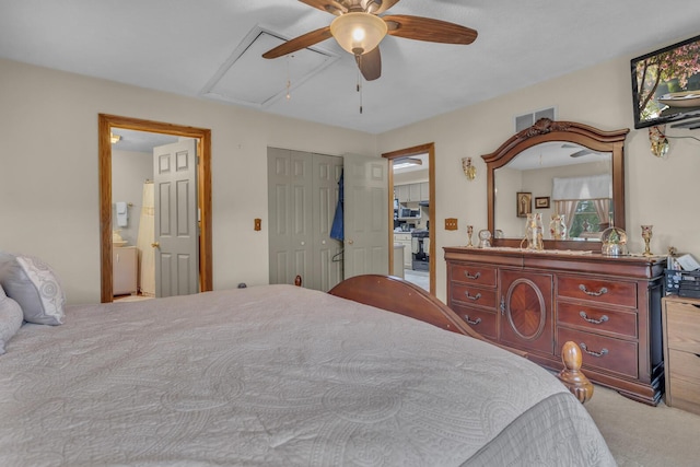 3460 Sears Rd, Horton, MI 49246 - bedroom with carpet flooring, attic access, a ceiling fan, and a closet