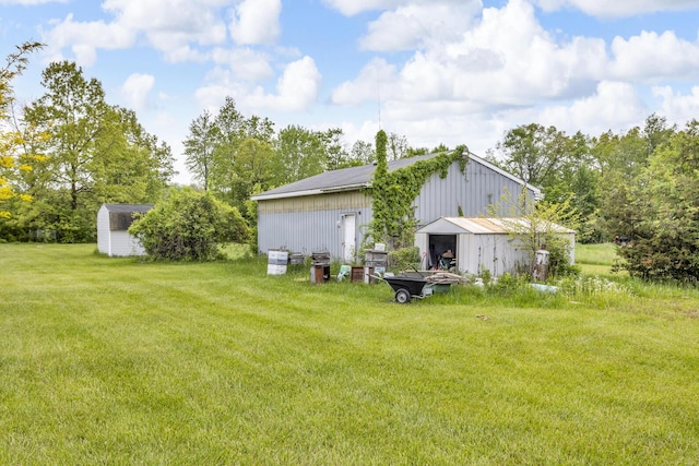 3460 Sears Rd, Horton, MI 49246 - view of grassy yard with an outbuilding and a pole building