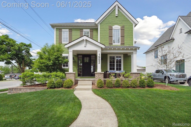 1992 Shipman Blvd, Birmingham, MI 48009 - view of front of home with a porch and a front lawn