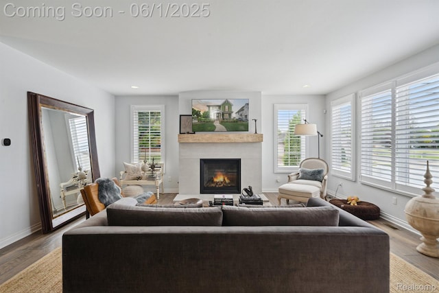 1992 Shipman Blvd, Birmingham, MI 48009 - living room featuring a lit fireplace, wood finished floors, baseboards, and recessed lighting