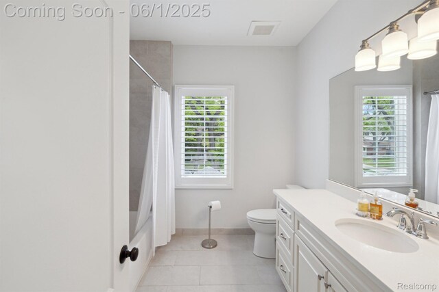 1992 Shipman Blvd, Birmingham, MI 48009 - bathroom featuring tile patterned flooring, vanity, toilet, baseboards, and shower / bath combination with curtain